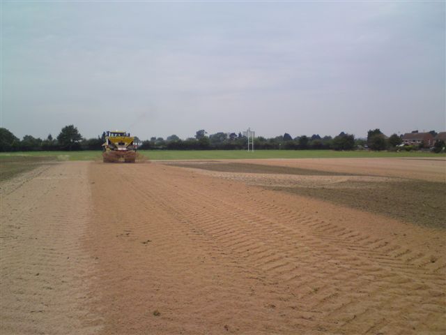 pitch drainage by spreading sand
